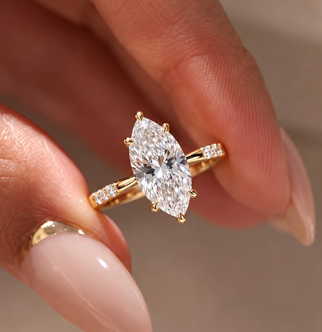 2 Carat Marquise Cut Moissanite Ring with Three Side Stones