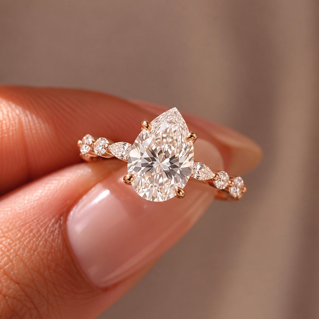 2 Carat Pear Cut Moissanite Ring with Twisted Band