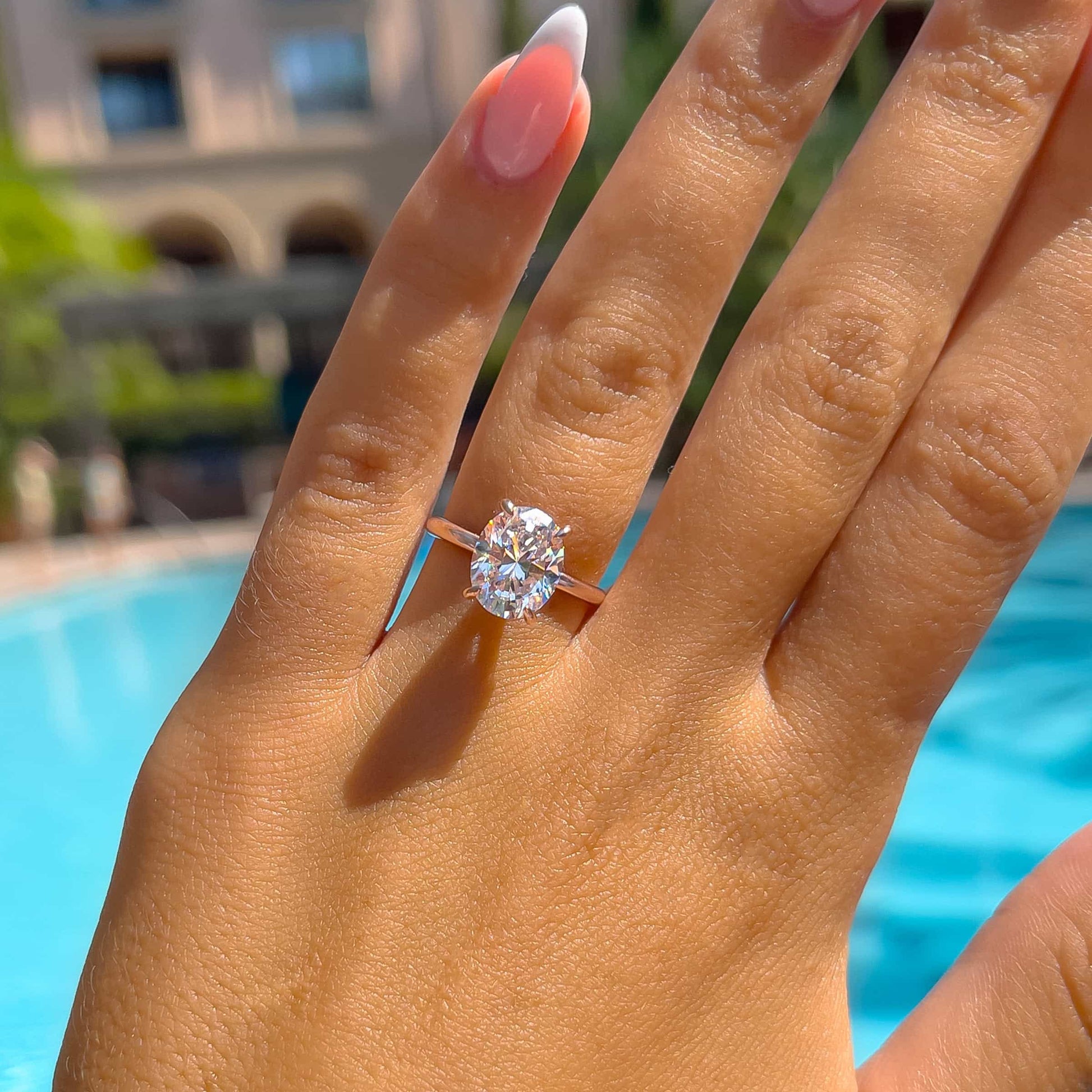 Oval Hidden Halo Engagement Ring