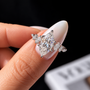 2 Carat Marquise Cut Moissanite Ring with Cluster Side Stones