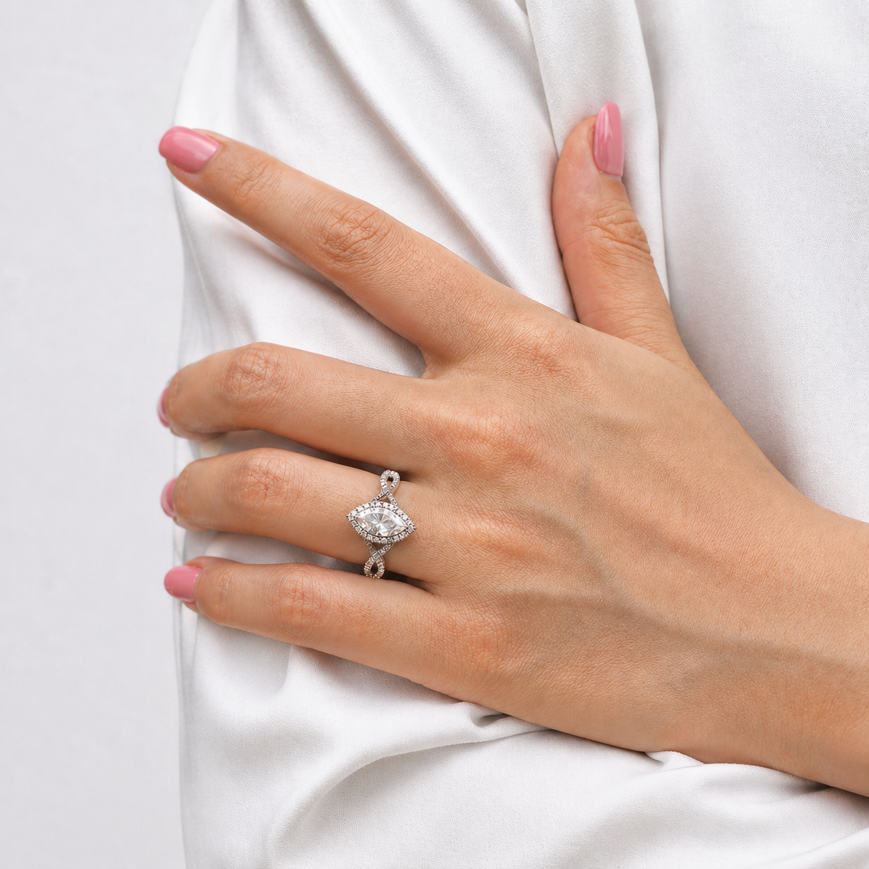Twisted Marquise Cut Halo Moissanite Ring