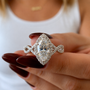 Twisted Marquise Cut Halo Moissanite Ring