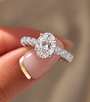 2 Carat Oval Cut Moissanite Ring with Twisted Pavé Band