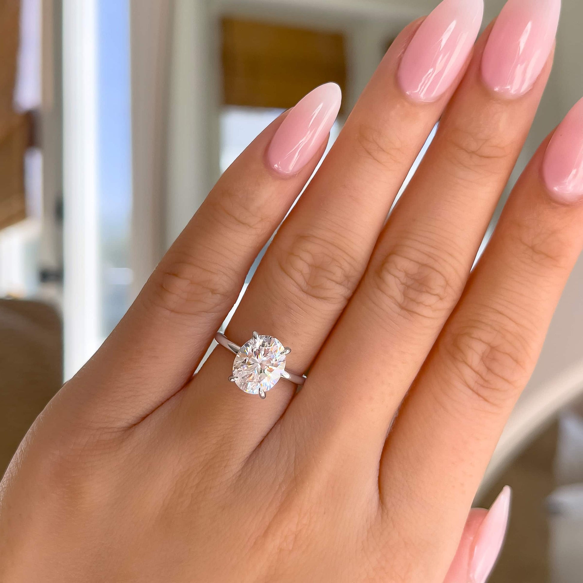 Oval Hidden Halo Engagement Ring