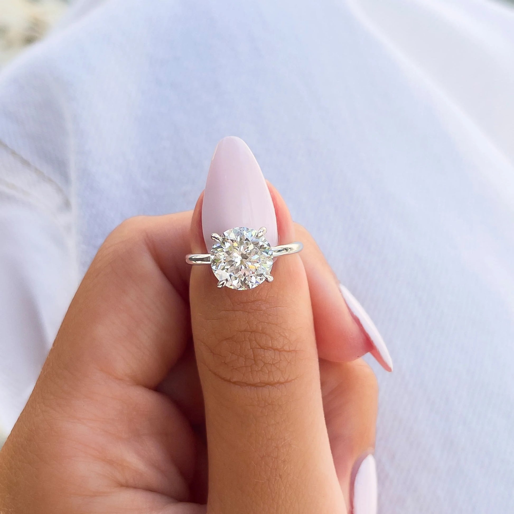 Round Hidden Halo Solitaire Engagement Ring